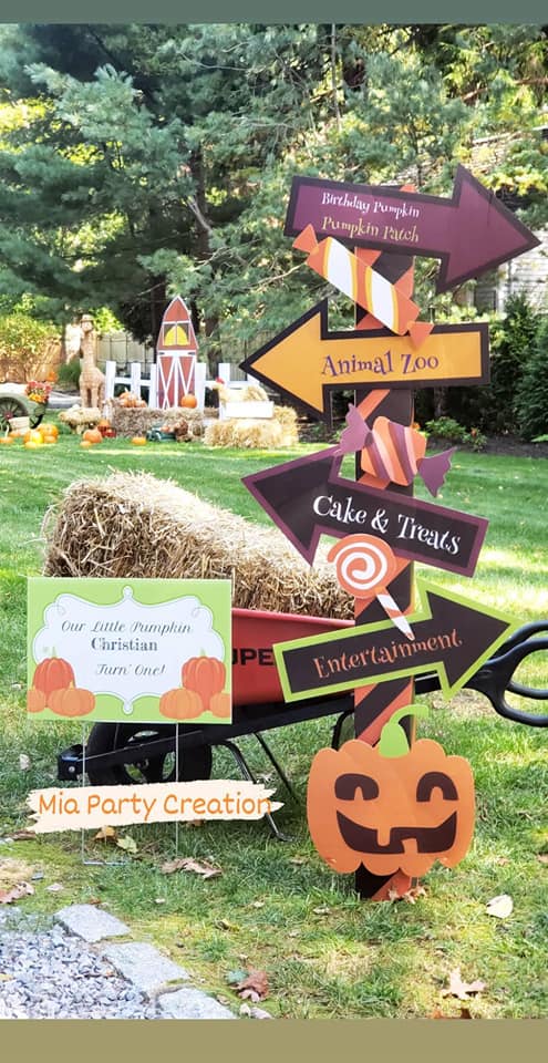 fall themed direction sign at party