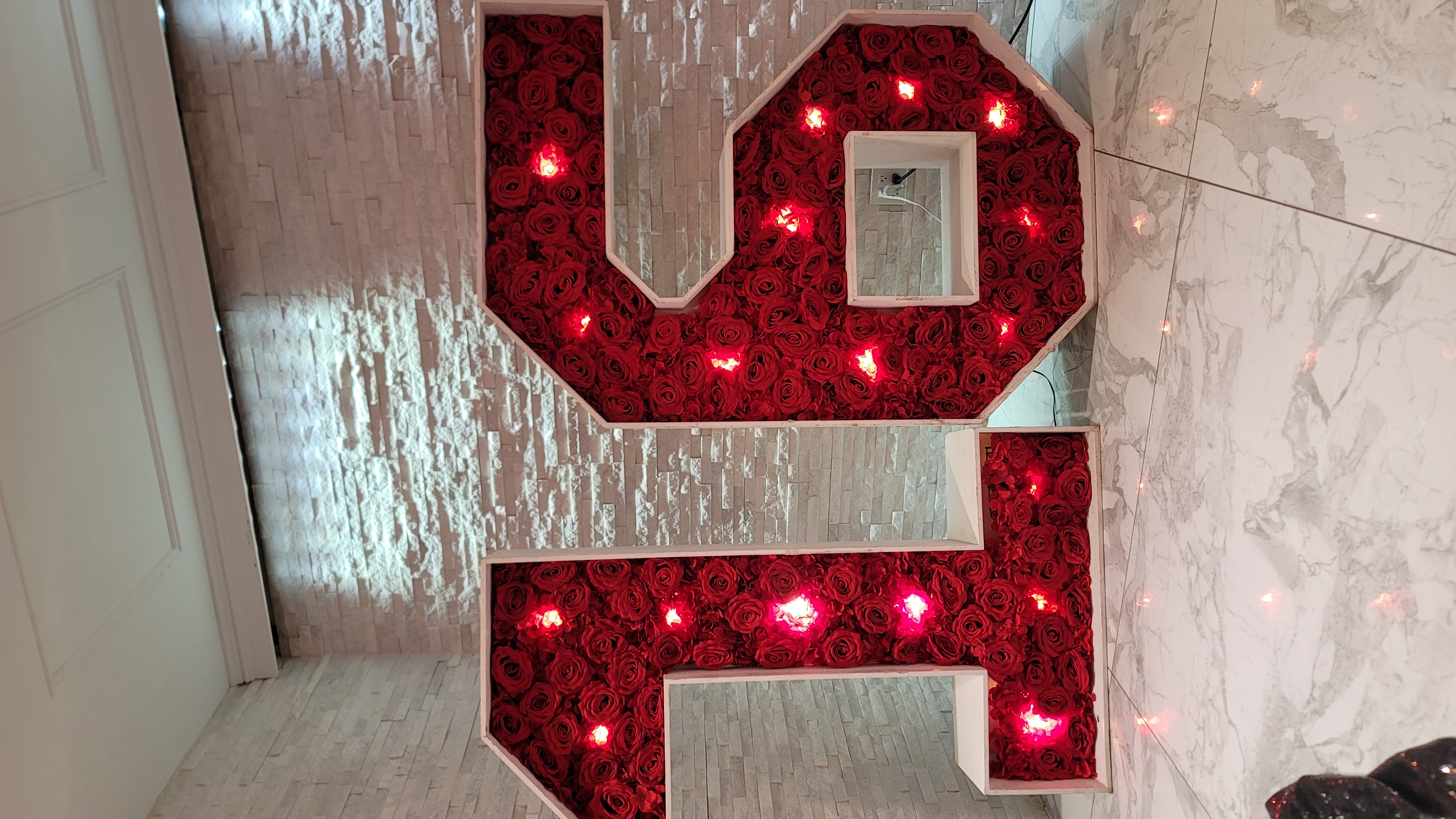 sweet 16 marquee numbers filled with red roses