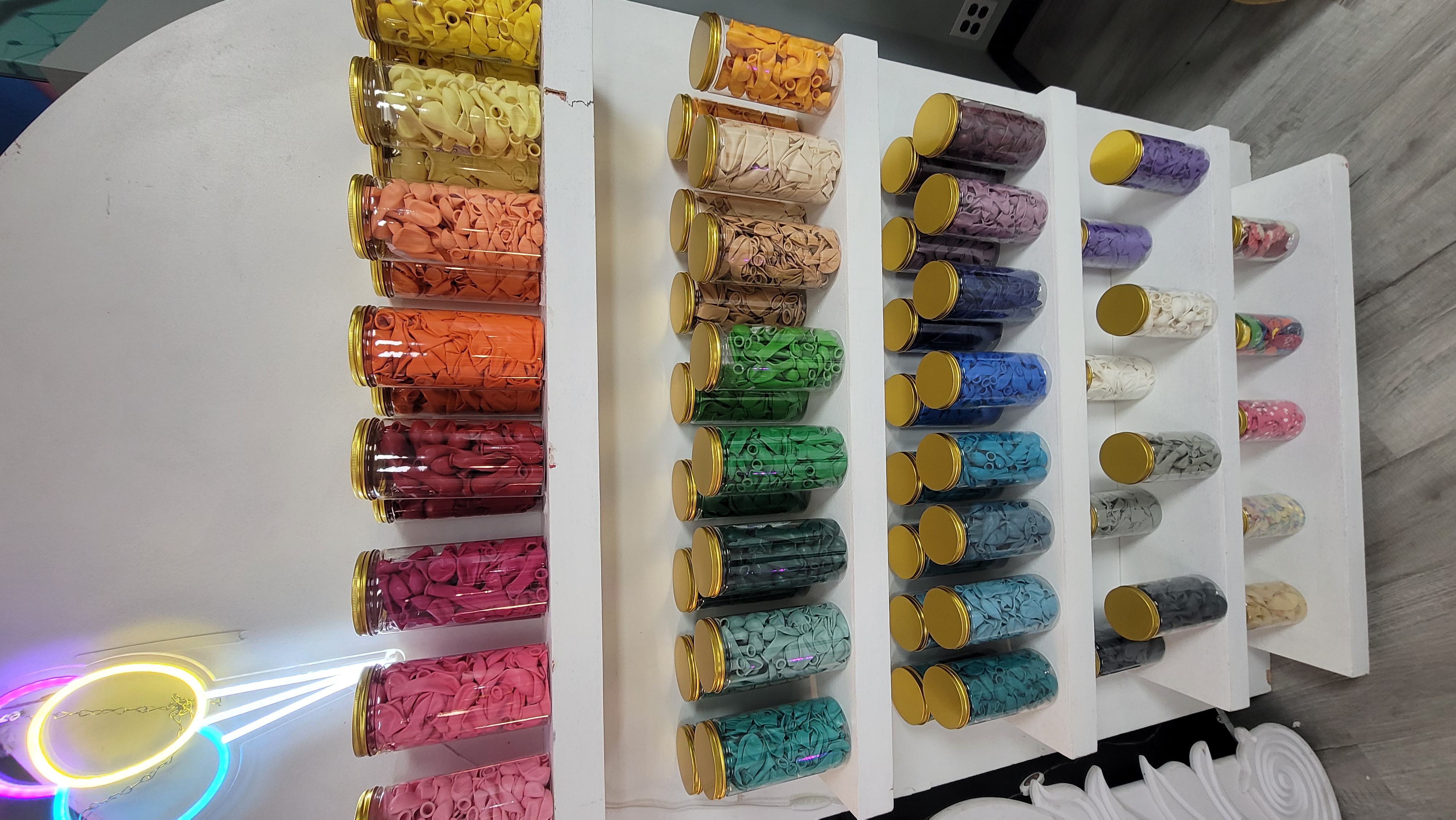 colorful balloon displays in jars