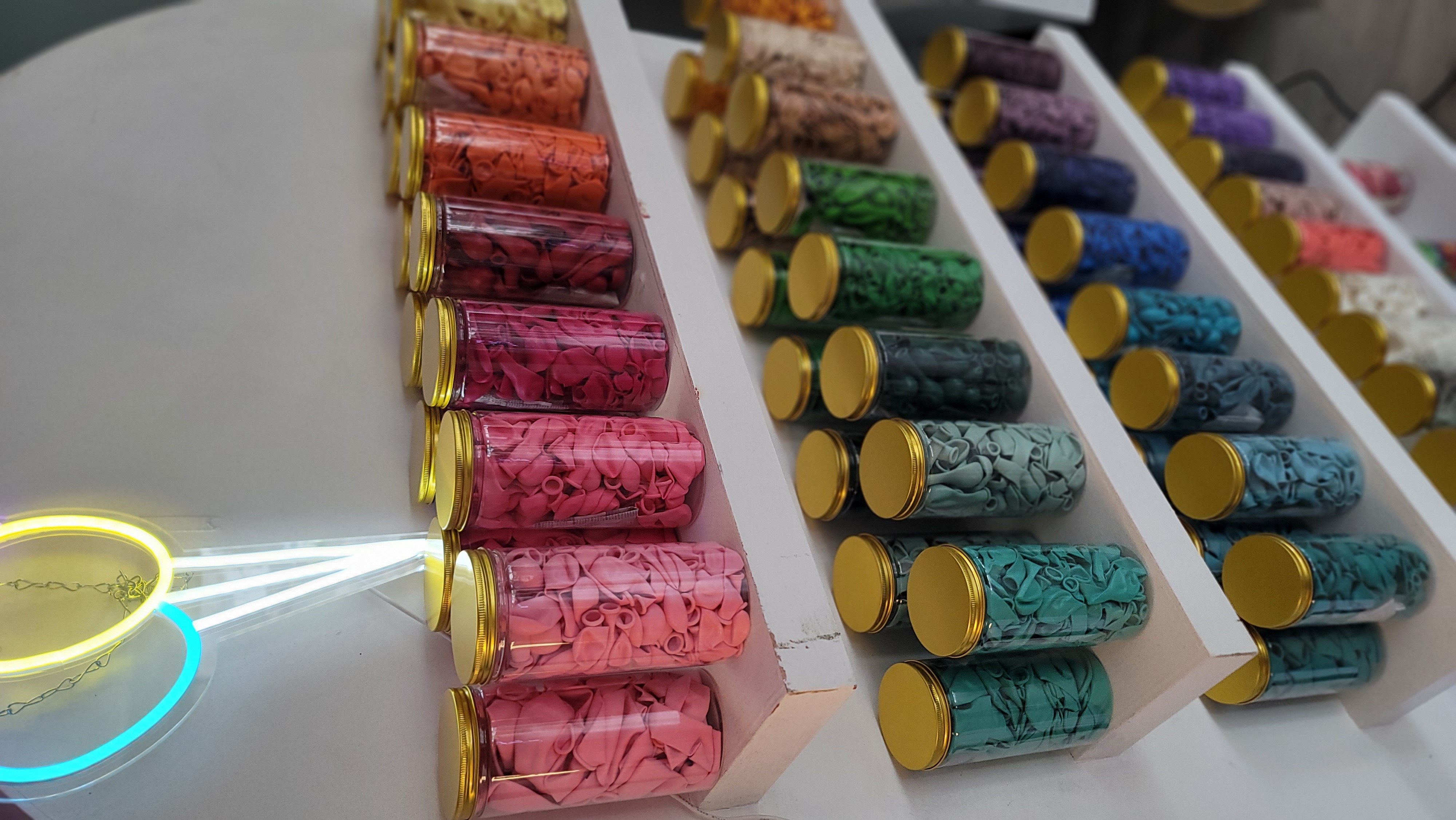 colorful balloons in jars