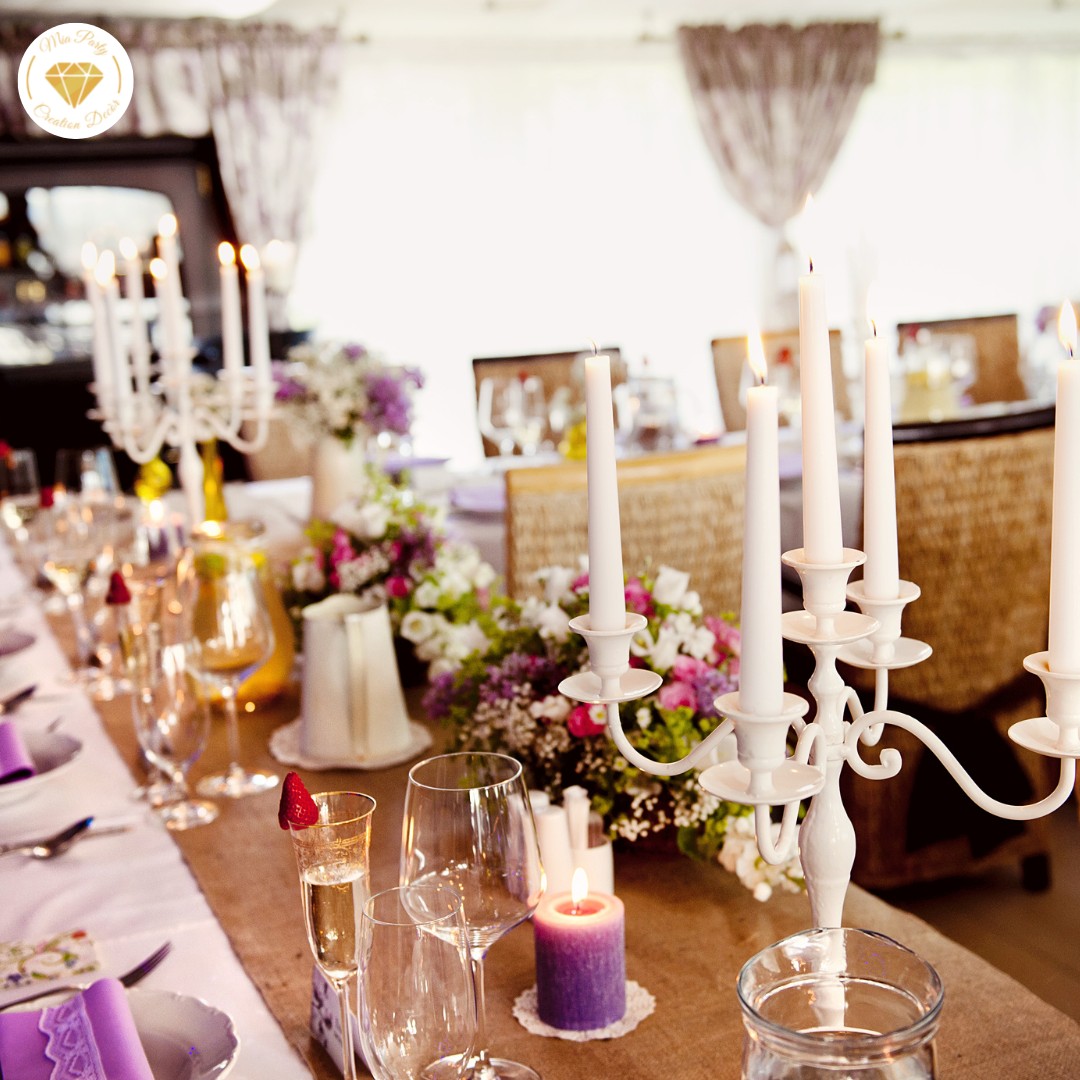white candlesticks on event table