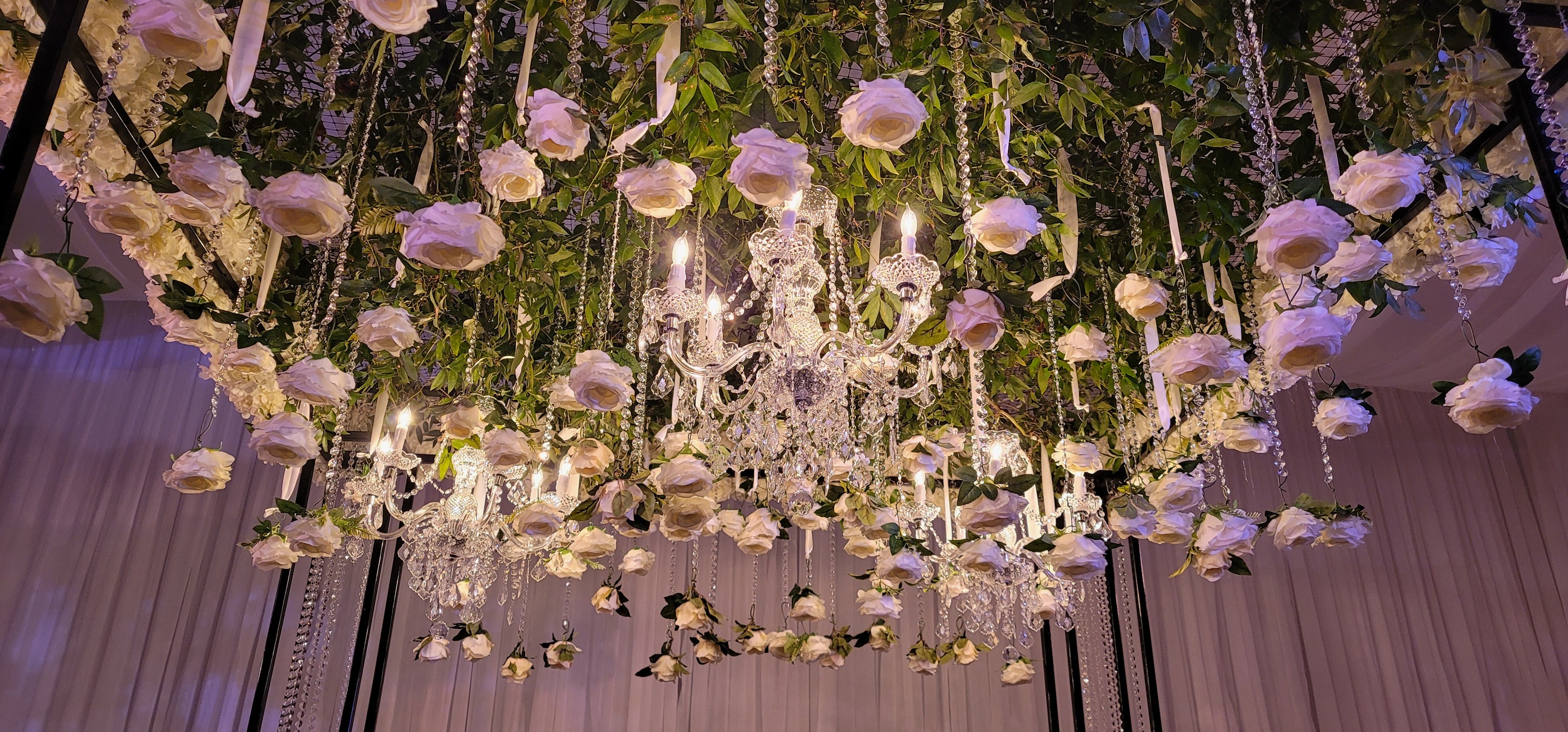 hanging white rose floral arrangement